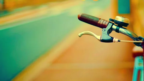 Bicycle handle with bell and brake, a cycling lifestyle on a summer day Stock-Footage 341969716
