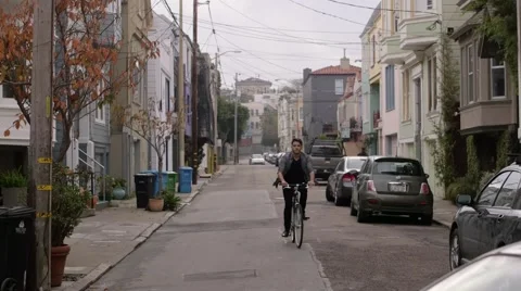 Bicycle man riding towards camera Stock Footage 64888645