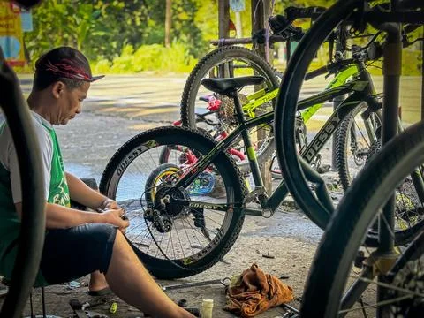A bicycle mechanic Stock Photos