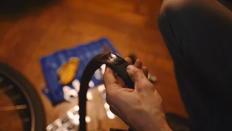 Bicycle mechanic work process in low key cinematic light Video stock 85400347