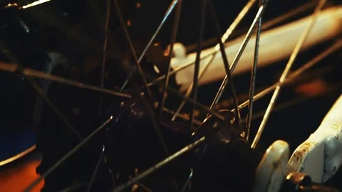 Bicycle mechanic work process in low key cinematic light Video stock 85400690