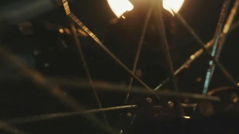 Bicycle mechanic work process in low key cinematic light Stock Footage 85400752