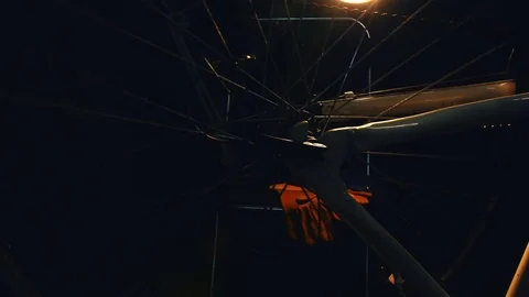 Bicycle mechanic work process in low key cinematic light Stock Footage 85400759