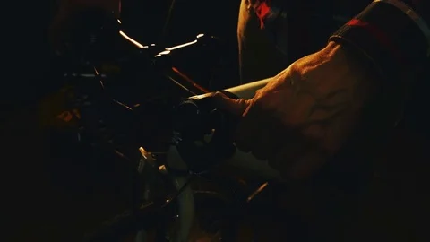 Bicycle mechanic work process in low key cinematic light 스톡 동영상 85401236