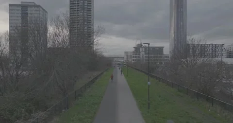 Bicycle moving on track between garden and vehicles parking area Stock-Footage 170944787