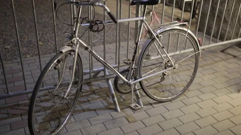 Bicycle in the night Stock Footage 81142516