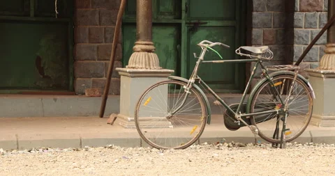 Bicycle at old building Stock Footage 324280750