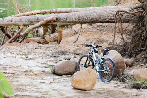 Bicycle over the precipice Stock Photos