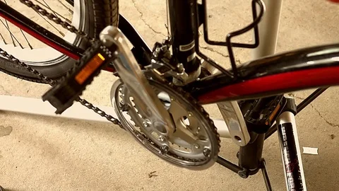 Bicycle owner adjusting front derailleur Video stock 78100415