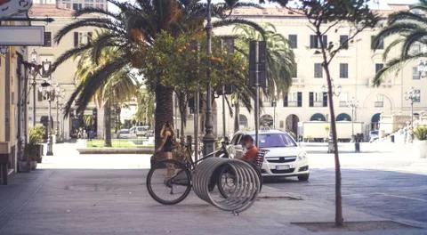 Bicycle parked in an empty square Foto stock