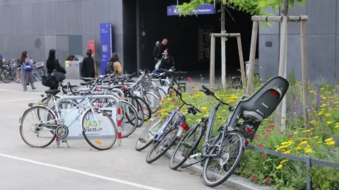 Bicycle parking area in Vienna featuring rows of parked bikes Stock Footage 320655780