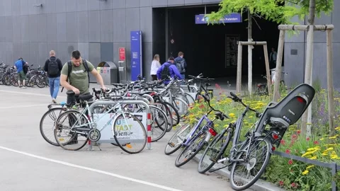 Bicycle parking area in Vienna featuring rows of parked bikes Stock Footage 320656218