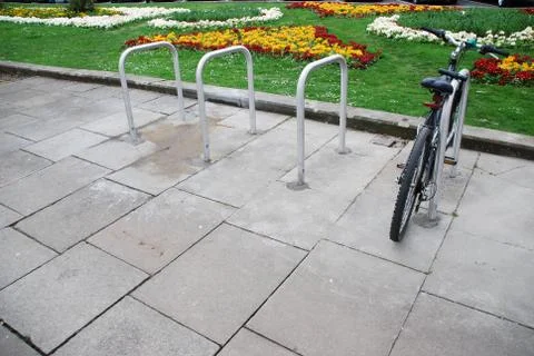 Bicycle on a parking rack Stock Photos