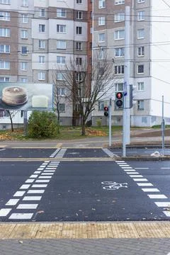 Bicycle path passing through the pedestrian crossing. Stock Photos