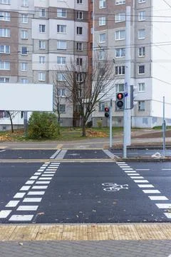 Bicycle path passing through the pedestrian crossing. Stock Photos