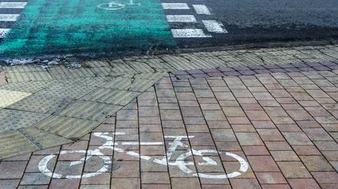 Bicycle path passing through the pedestrian crossing. Road Bike detail. Pedes Stock Photos