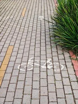 Bicycle Path on Paved Stones Stock Photos