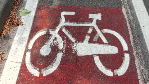 Bicycle path sign on red asphalt Stock Footage 312960519