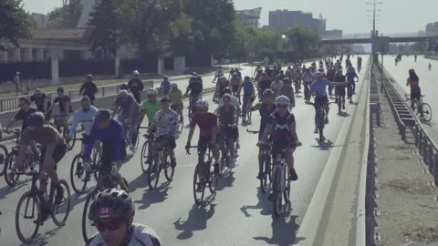 Bicycle procession along a boulevard in Sofia 動画素材 346375240