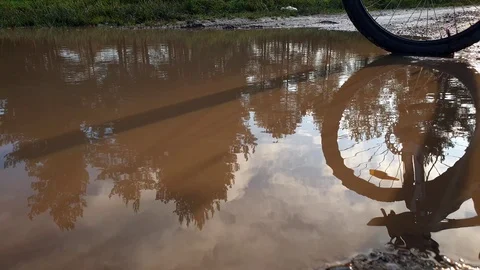 Bicycle in a puddle. Bicycle off-road. Stock Footage 117983066