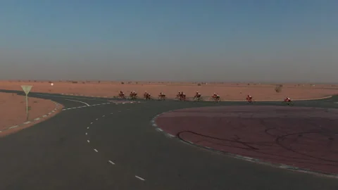 Bicycle race in the desert Stock Footage 138137434