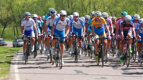 Bicycle Race. A group of cyclists overcomes the rise. Stock Footage 49902800
