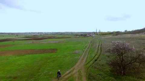 Bicycle race on the mountain. View quadrocopter Stock Footage 74705007