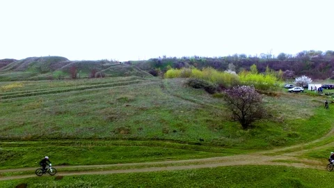 Bicycle race on the mountain. View quadrocopter Stock Footage 74705286