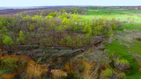 Bicycle race on the mountain. View quadrocopter Stock Footage 74710441