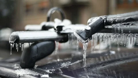 Bicycle rack on a car covered in ice after frozen rain phenomenon 스톡 동영상 102127871