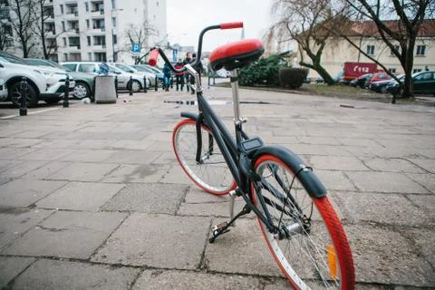 Bicycle for rent with code system unlockable via mobile application on a street Foto stock
