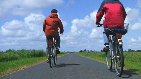 Bicycle ride on lonely highway Stock Footage
