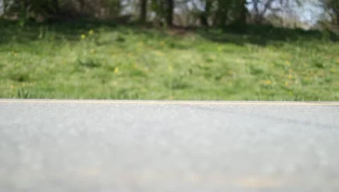Bicycle ride by low mounted slide left Stock-Footage 10857096