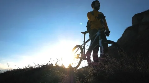 Bicycle rider on the hill Stock Footage 99603454