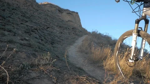 Bicycle rider on the hill Stock Footage 99603884