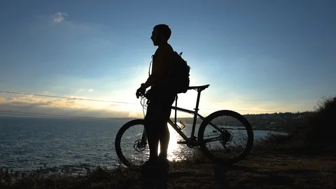 Bicycle rider on the hill Stock Footage 99603960