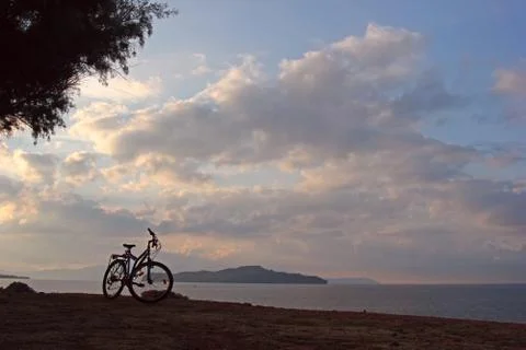 Bicycle at seashore Stock Photos