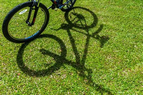 Bicycle shadow. Stock Photos