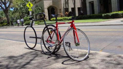 Bicycle shape rack with red cycle Stock Photos