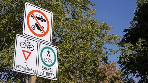 Bicycle signs on pathway Stock Footage 70069622