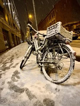 Bicycle in the snow Stock Photos