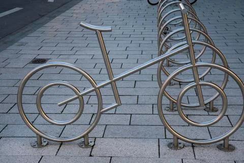 Bicycle stand in the form of a bicycle Stock Photos