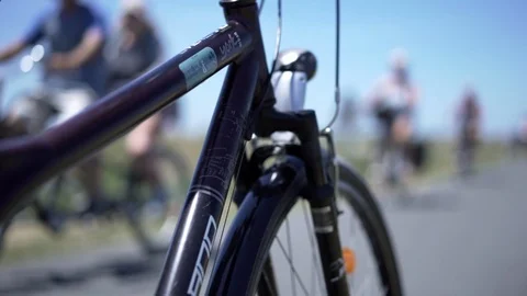 Bicycle Touring - close up with shallow depth of field. Bikes in the background Video stock 95937672