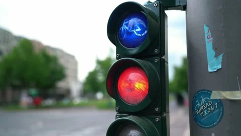 Bicycle Traffic light in Berlin. Red light. Blue light with Bicycle icon Stock Footage 195816987