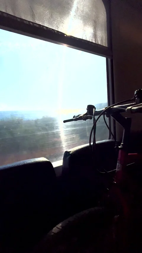 Bicycle on the train. A bicycle while traveling in Italy Stock Footage 277954482