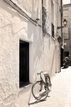 Bicycle at a wall Stock Photos
