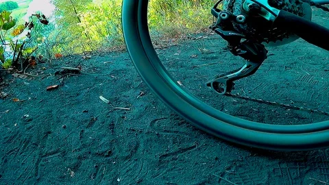 The bicycle wheel makes dust Stock Footage 94341089