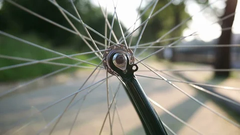Bicycle wheel rotating Stock Footage 93280854