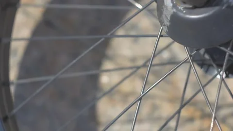 Bicycle wheel is spinning Stock Footage 81811471