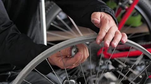 Bicycle Wheel Truing Hands Adjusting Spokes Close Up Видео 334245796